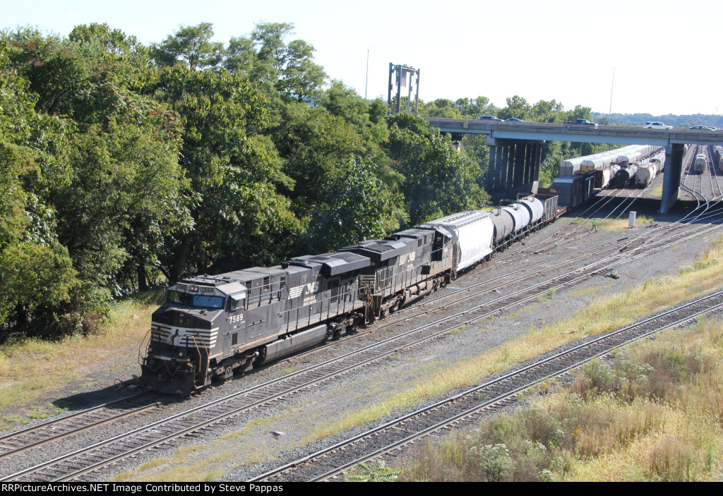 NS 7569 andd 7666 pull train 27N out of Enola yard